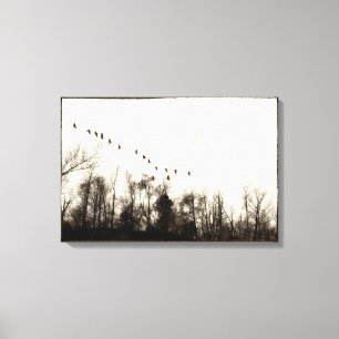 Canada Geese Flying Over Treeline Warm Monochrome Canvas Print
