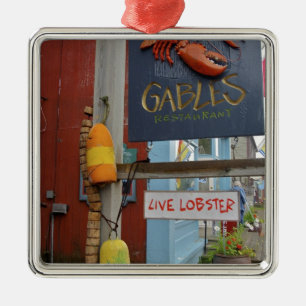 Canada, New Brunswick, St Andrews. Colourful Metal Tree Decoration