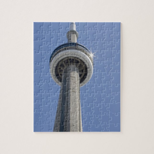 Canada, Ontario, Toronto. Top of CN Tower with Jigsaw Puzzle (Vertical)