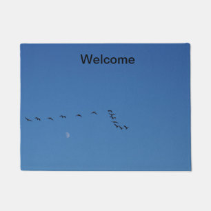 Canadian geese in flight doormat