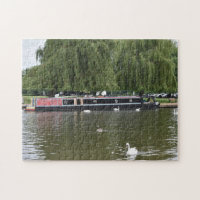 Canal Boat and Swans on the River Avon England UK