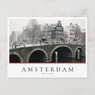 Canal in Amsterdam in winter Postcard