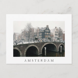Canal in Amsterdam in winter Postcard