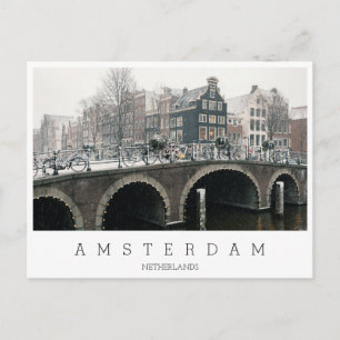 Canal in Amsterdam in winter Postcard