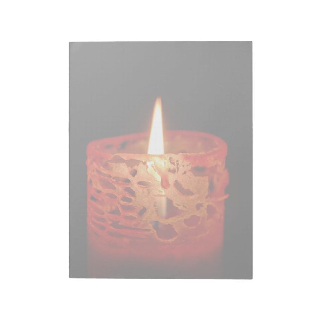 Candle on a black background notepad (Rotated)