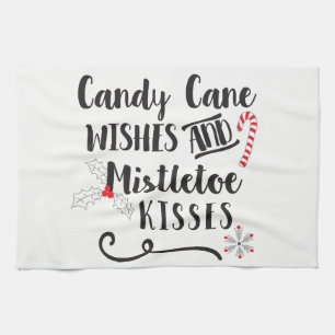 candy cane wishes and mistletoe kisses tea towel