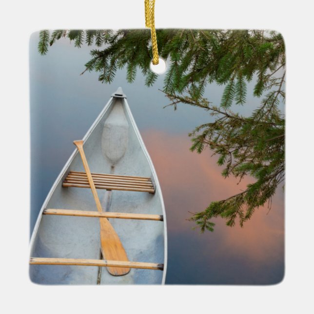 Canoe on lake at sunset, Canada Ceramic Tree Decoration (Front)