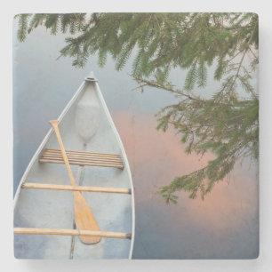 Canoe on lake at sunset, Canada Stone Coaster