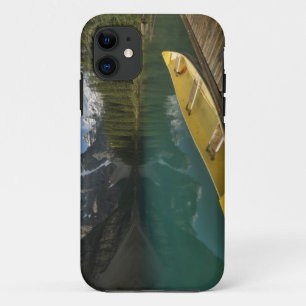 Canoe parked at a dock along Moraine Lake, Banff iPhone 11 Case