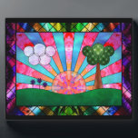 Canticle of the Sun Photo Plaque<br><div class="desc">A digital stained-glass design in the Art Deco style popular in the 20th century. The widely-used sunburst motif is central, rising behind a green landscape balanced by a tree on one side and clouds and flowers on the other. Geometric shapes are used to emphasise the symmetry of the scene, with...</div>