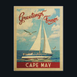 Cape May Sailboat Vintage Travel New Jersey Postcard<br><div class="desc">This Greetings From Cape May New Jersey vintage travel nautical design features a boat sailing on the water with seagulls and a blue sky filled with gorgeous puffy white clouds.</div>