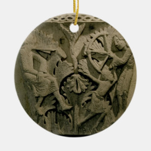 Capital depicting a man shooting an arrow into the ceramic tree decoration