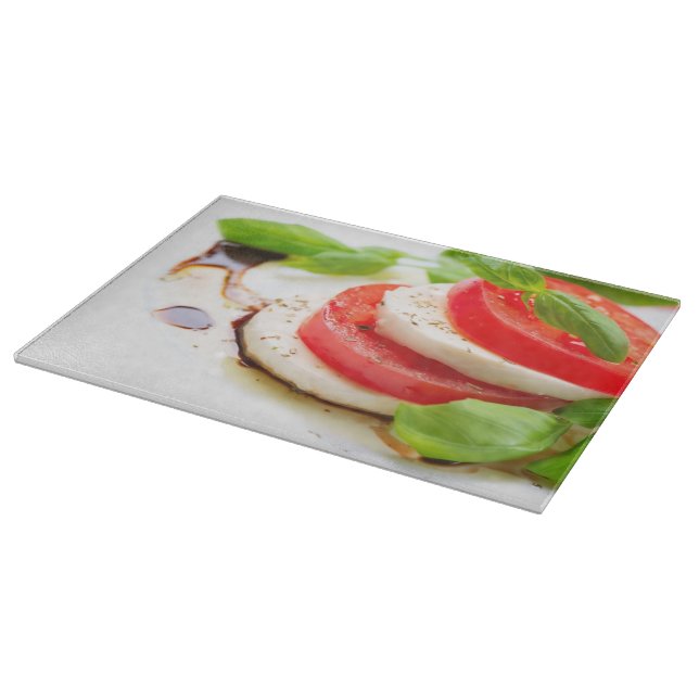 Caprese Salad. Tomato and Mozzarella slices Cutting Board (Corner)
