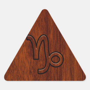 Capricorn Zodiac Symbol in Mahogany Brown Triangle Sticker