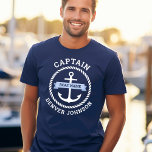 Captain anchor rope border boat name on banner T-Shirt<br><div class="desc">Navy blue tee shirt featuring a white nautical anchor surrounded by a rope border. Across the anchor is a light blue ribbon with your boat's name. Add title,  for example captain,  at the top and a custom name at the bottom.</div>