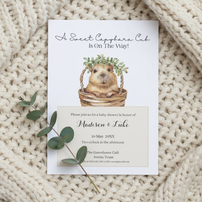 Capybara Baby Shower • Eucalyptus Design Invitation (Baby shower invitation with capybara design on cream knitted blanket and eucalyptus sprig)