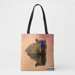 Capybara Emerging From a Tranquil Lake Art Tote Bag