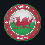 Cardiff Wales Magnet<br><div class="desc">A 3D depiction of the Welsh national flag,  sits in the middle of the design The capital city,  Cardiff,  is at the top of the image,  and the country,  Wales,  is at the bottom of the image. In between the two pieces of text are decorative stars and two fleur-de-lis.</div>