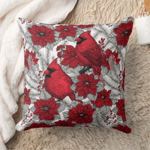 Cardinals and poinsettia in red and white cushion