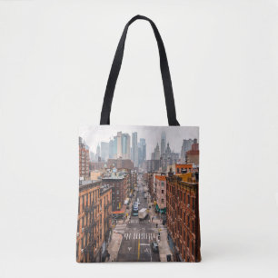 CARS ON ROAD BETWEEN HIGH RISE BUILDINGS DURING DA TOTE BAG