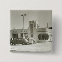 Cars parked at gas station