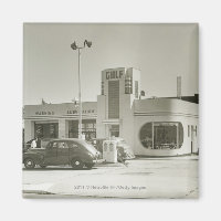 Cars parked at gas station