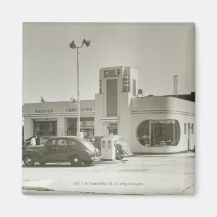 Cars parked at gas station magnet