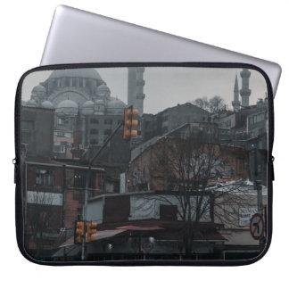 CARS PARKED NEAR BUILDING LAPTOP SLEEVE
