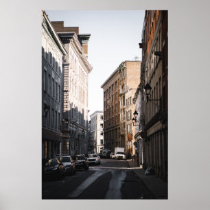 CARS PARKED ON SIDE OF THE ROAD IN BETWEEN BUILDIN POSTER