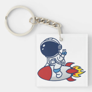 Cartoon Astronaut Riding a Rocket Illustration Key Ring