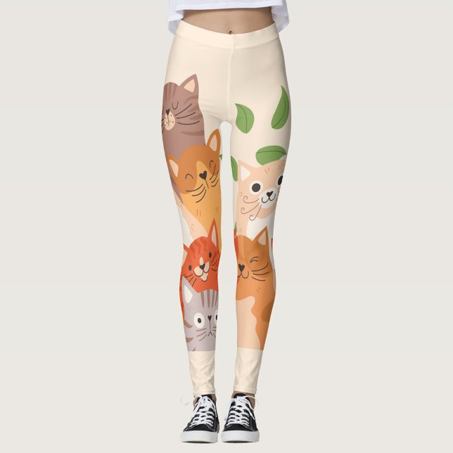 Cartoon Cats Flip Flops Leggings (A woman is wearing leggings with a pattern of cartoon cats and green leaves.)
