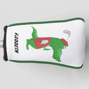 Cartoon crocodile playing golf with a red hat. golf head cover