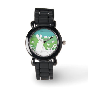 Cartoon easter bunny in green spring nature  watch