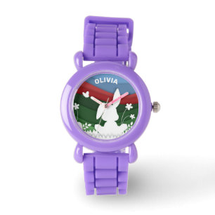 Cartoon easter bunny on grass spring holiday watch