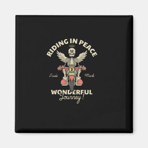 cartoon emblem of skull angel riding motorcycle magnet