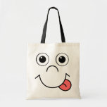 Cartoon face tote bag<br><div class="desc">Funny smiling cartoon face with tongue out</div>