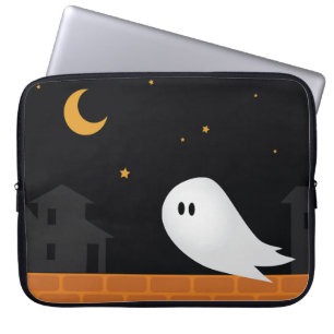 Cartoon ghost wandering in city at night laptop sleeve
