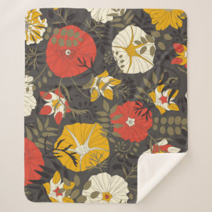 cartoon leaves and flowers on a dark background in sherpa blanket