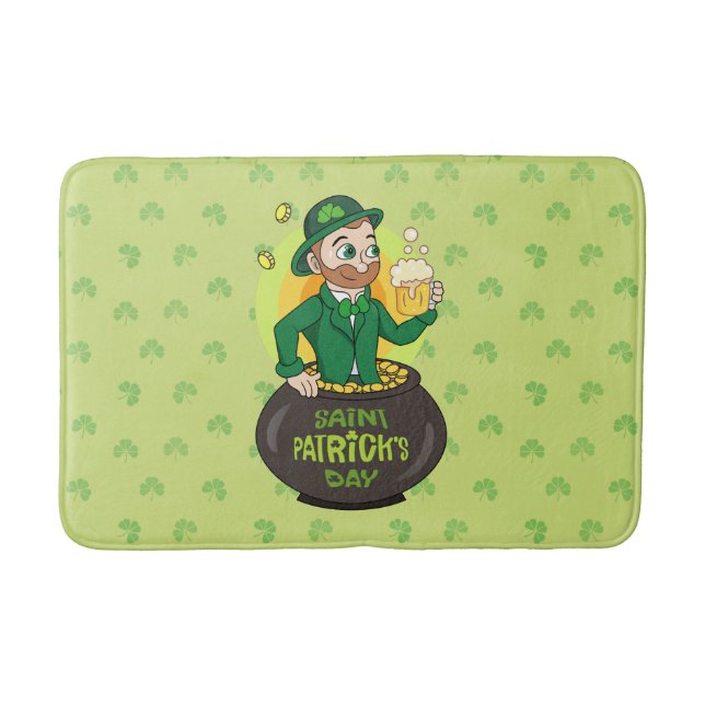 Cartoon leprechaun in a pot of gold holding a pint bath mat (Front)