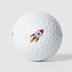Cartoon rocketship golf balls