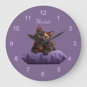Cartoon Tortoiseshell Kitten on Purple Cushion Large Clock