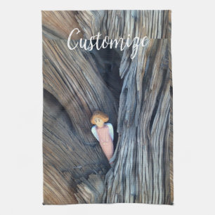 Carved angel in tree Thunder Cove Tea Towel