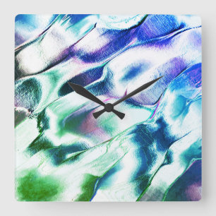 Carved from matte metal, green to blue lilac stain square wall clock
