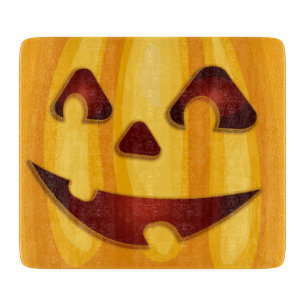 Carved pumpkin smiling Halloween design Cutting Board