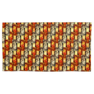 Carved rectangular pieces reddish and beige align pillowcase