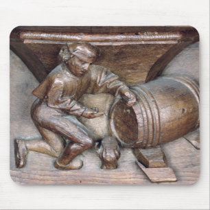 Carving depicting a man putting a tap on barrel mouse mat