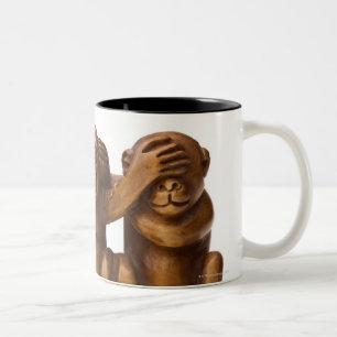 Carving of three wooden monkeys Two-Tone coffee mug