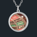 Casino Gambling Roulette Wheel Vintage Retro Style Silver Plated Necklace<br><div class="desc">A close up image of a gaming casino roulette wheel with large numbers. The colours are reminiscent of retro designs from the fifties and the  numbers have a faded vintage look to them.</div>
