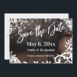 Casual Handwriting Lights Lace & White Flowers Save The Date<br><div class="desc">This card is covered in an image that includes part of a wooden barrel against a dark rustic brown wall. Perfect for your whiskey, wine, brewery, winery or other rustic-themed wedding celebration. This background image was draped in graphics depicting strings of twinkling lights, white watercolor floral sprays, and lace accents....</div>
