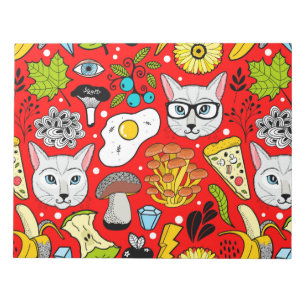 Cat and egg on red notepad